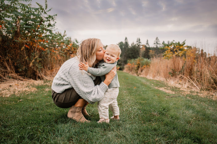 mom hugging toddler at westmoor park