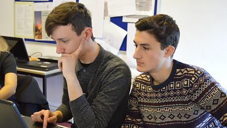 Young Man Smiling in the Office