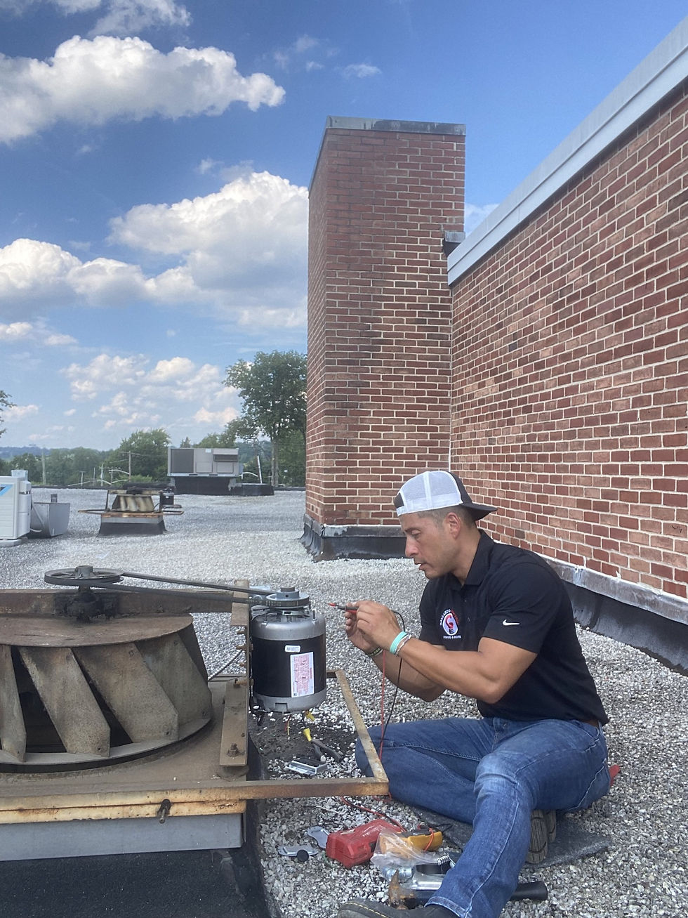 School maintenance, roof fans, installation