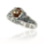 This ring is one from our Delicate collection. The art nouveau-inspired design is all flowing lines and delicate features (thus the name). It features a very vintage style 8x6mm pear shaped stone. It measures 8.65mm in the center front and tapers down to a more comfortable 3.3mm around the back. 

This ring can accommodate a faceted or cabochon stone.

Catalogue Number RS-21