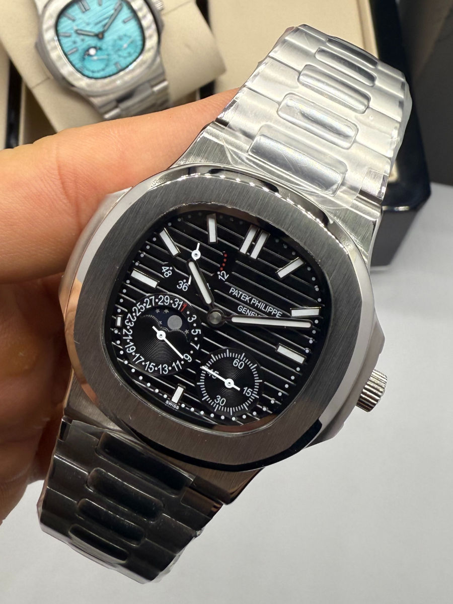 Patek Philippe Nautilus Fases da Lua 40mm, Aço, Mostrador Preto
