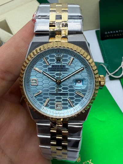 Rolex Oyster Perpetual Land‑Dweller 40mm Aço/Dourado, Mostrador Azul Glacial