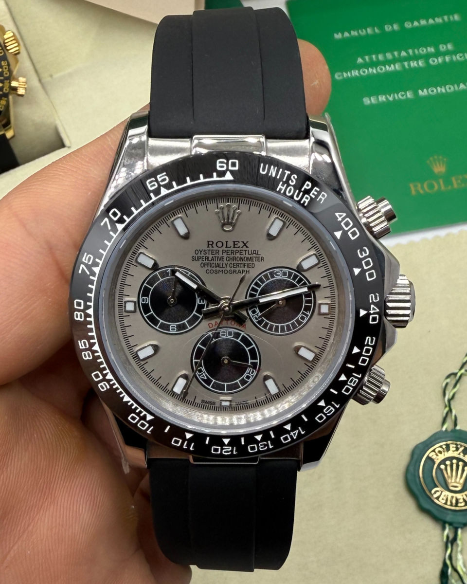 Rolex Rolex Daytona 40mm Aço Mostrador Prata Luneta Preta, Pulseira OysterFlex