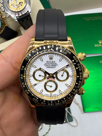 Rolex Daytona 40mm Dourado Mostrador Branco Luneta Preta