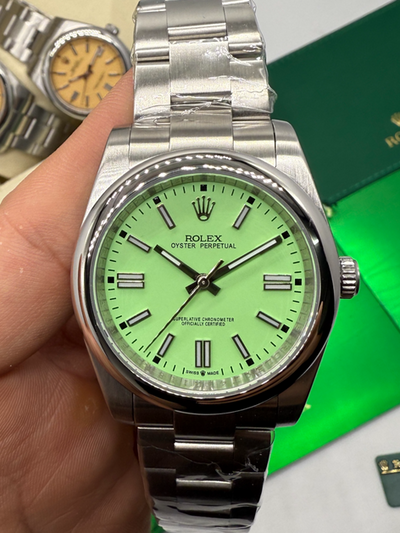 Rolex Oyster Perpetual 41/36mm Aço Mostrador Verde Luneta Baulada