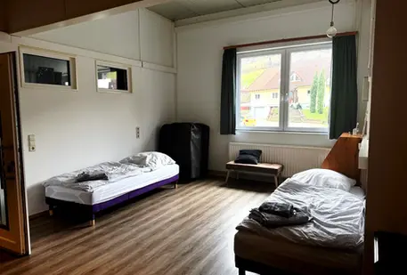 Schlafzimmer mit variablen Einzelbetten im Bandloft