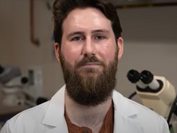 Musically minded PhD candidate targets movement disorders through fruit flies