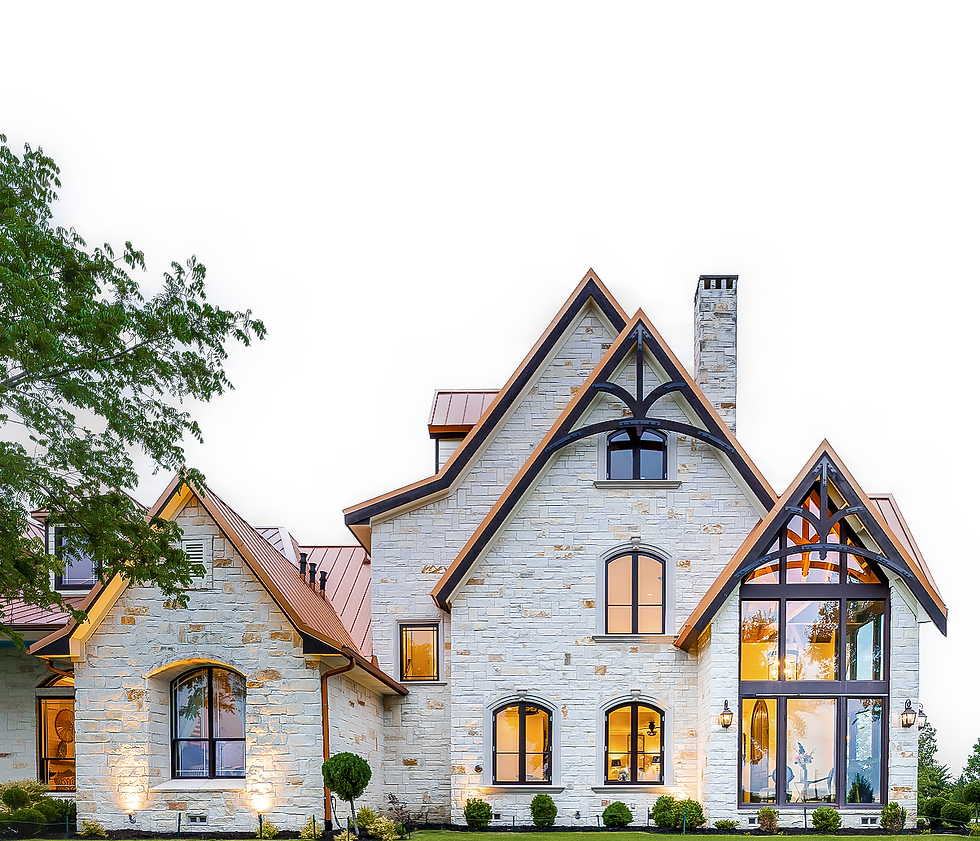 Luxury custom home exterior with light natural stone, dramatic steep rooflines, black-framed windows, warm interior lighting,