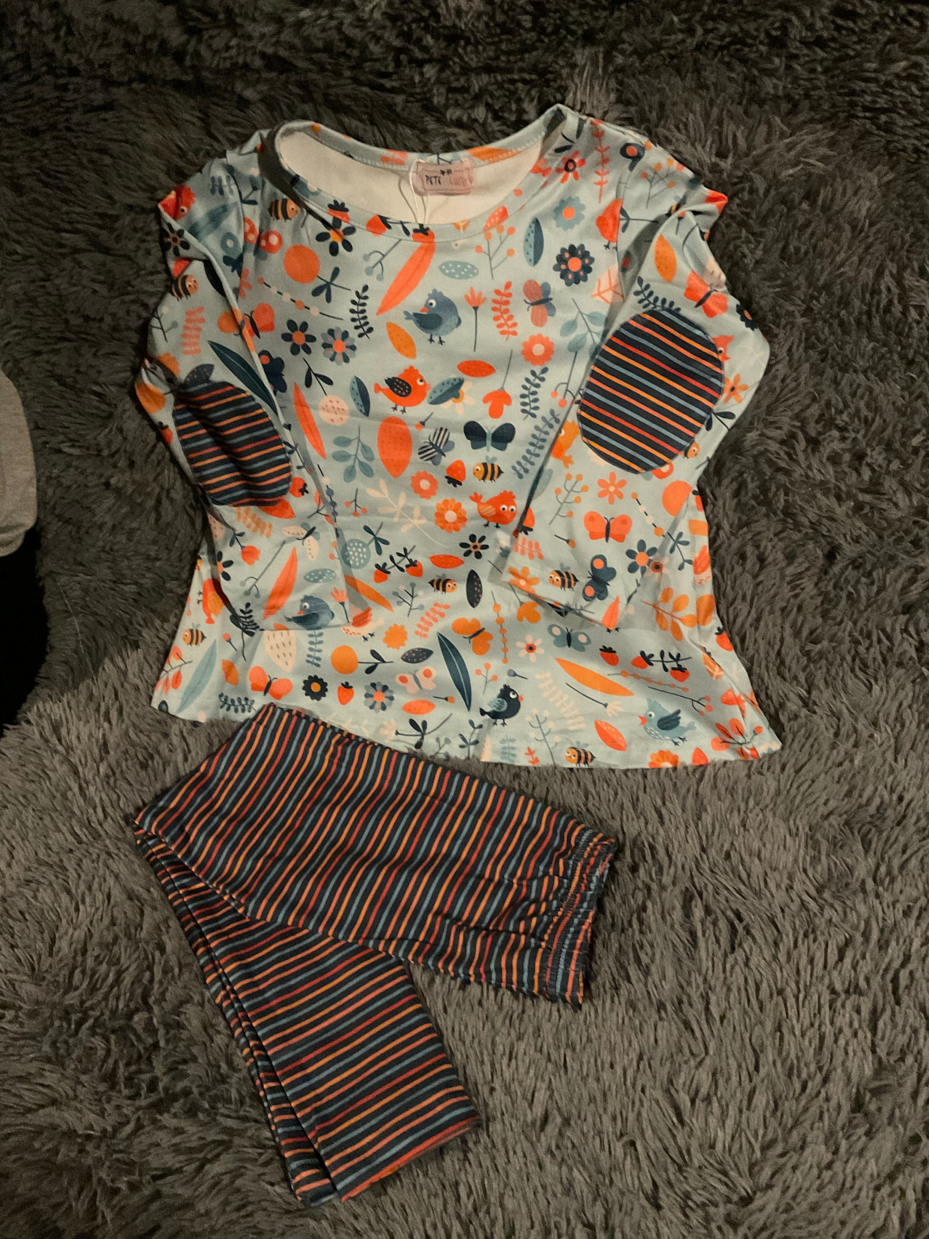 Light blue shirt with bass stripe and pants