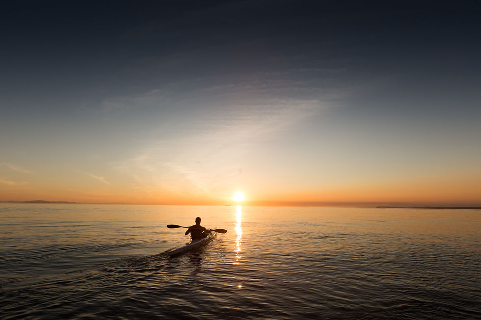 Kayaker At Sunrise
