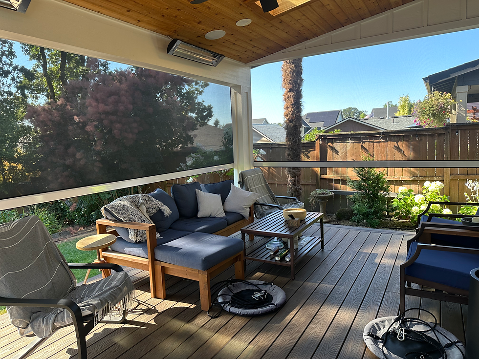 Covered patio with cedar ceiling and motorized screens installed by AB Construction LLC in Oregon City Oregon