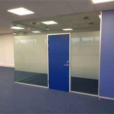 Solid frost band manifestation for partial privacy and comply with building regulations in corner office