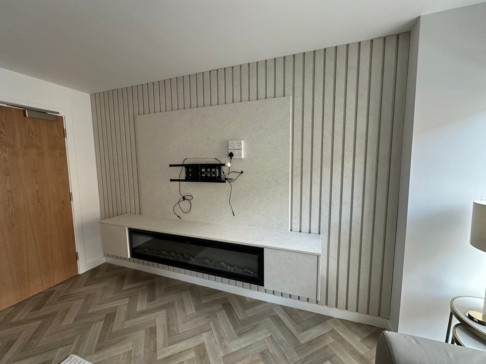 Cream concrete vinyl wrapped onto media wall panels