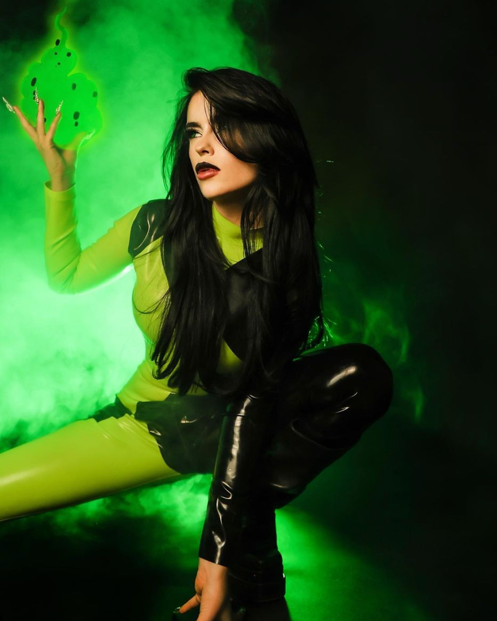 Unleash your inner supervillain with our Latex Shego Inspired Catsuit.