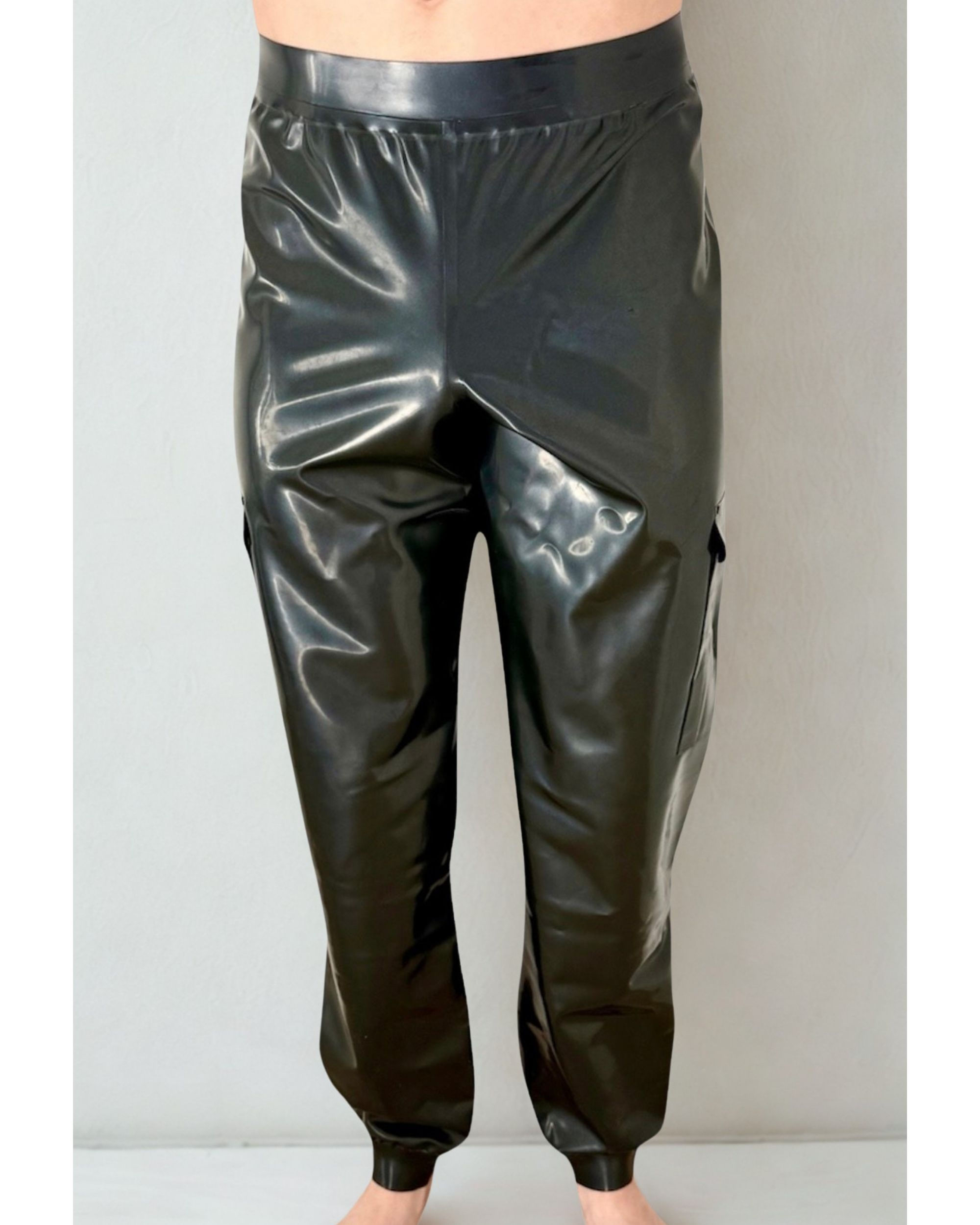 latex pants stretch waistband and cuff 2 side pouch pockets on leg.