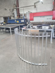 Metal fence being fabricated in a workshop; custom metal fabrication service. All Custom Solutions.