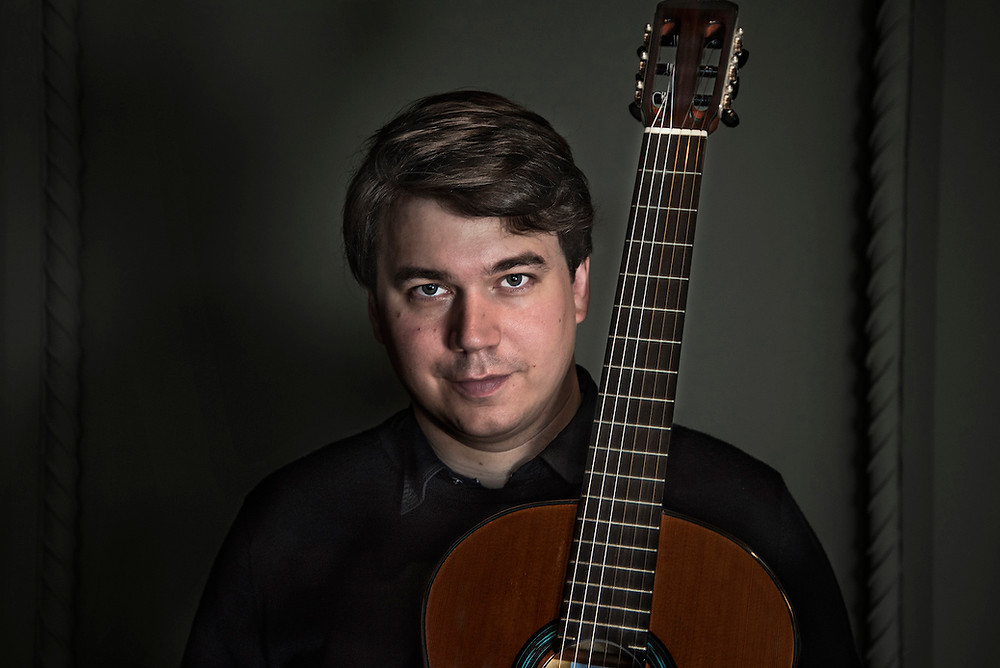 Patrik Kleemola gives the YouTube premiere of Markku Klami's Etudes for guitar (2021). Photograph by Vesa Aaltonen.