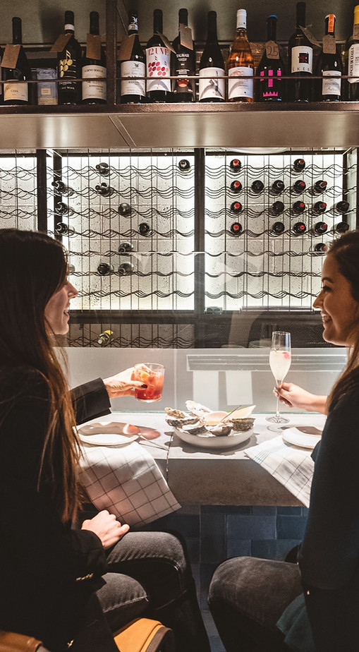 Two friends celebrating a birthday at Baccala, birthday restaurant in Bermondsey.