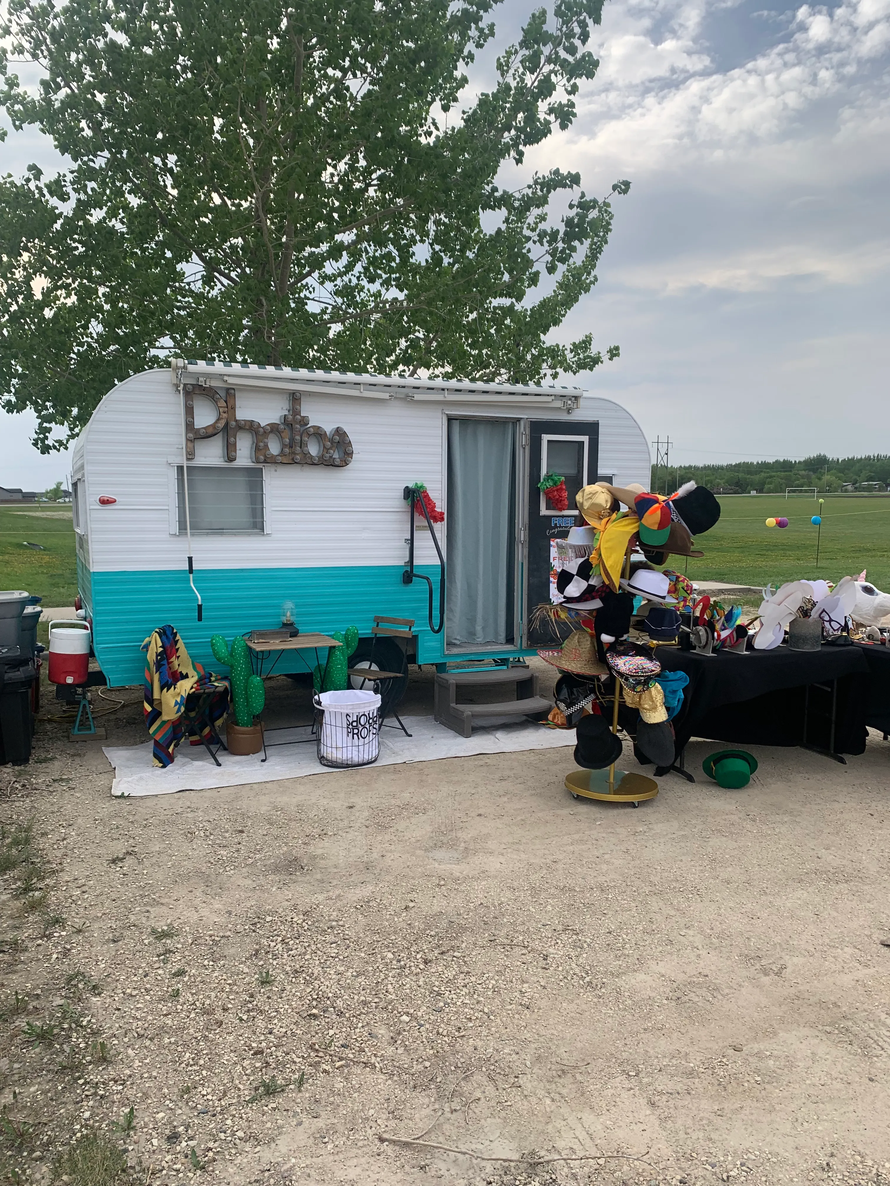 Camper Photo Booth set-up with a few Fiesta themed props (to windy for full set-up)