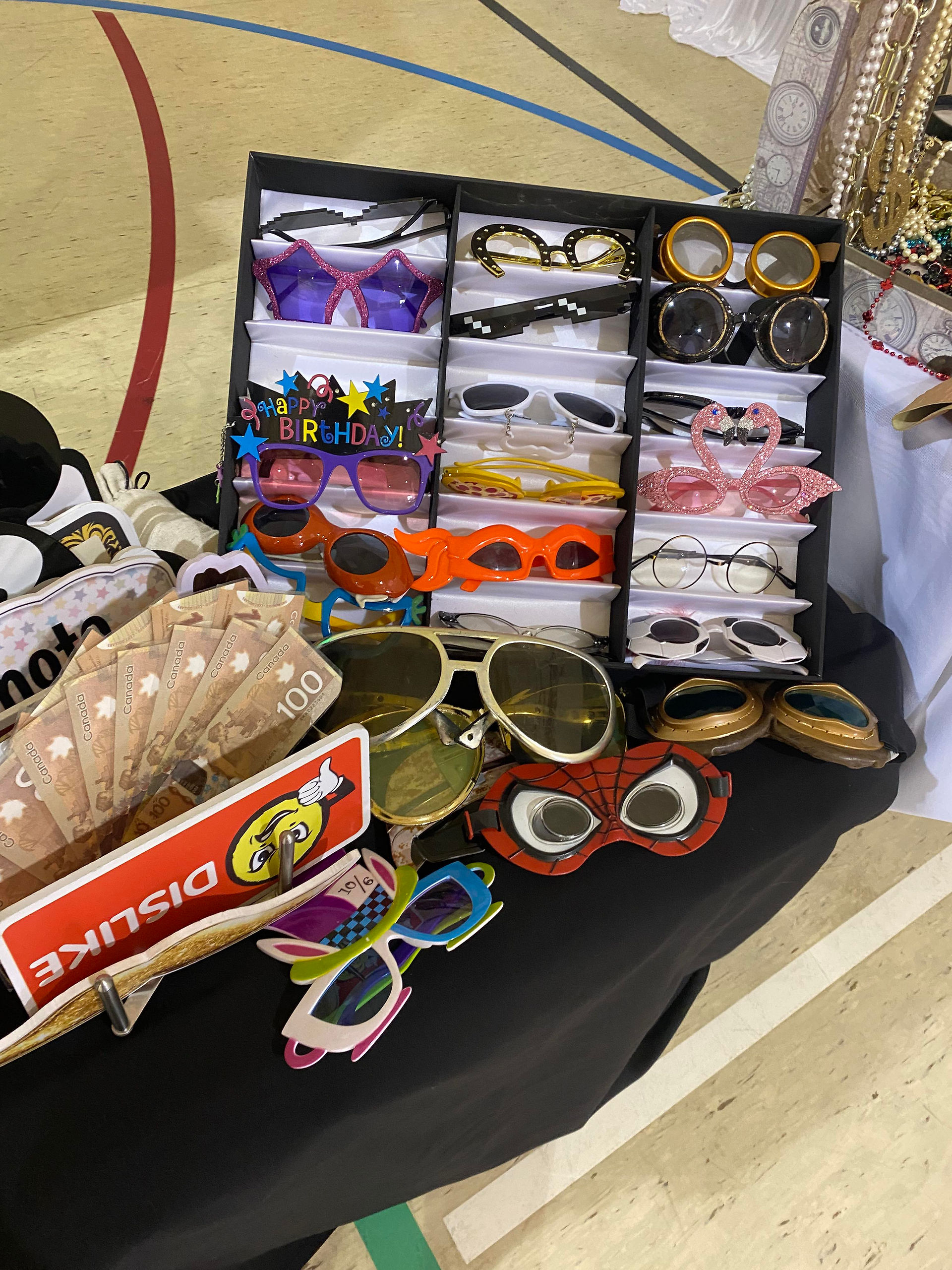 Some of the everyday props you get when you rent our booth in Winnipeg and Southern Manitoba. Boas, glasses, hats , flowers, money, boxing gloves, signs, crown, gloves., jackets, flag..