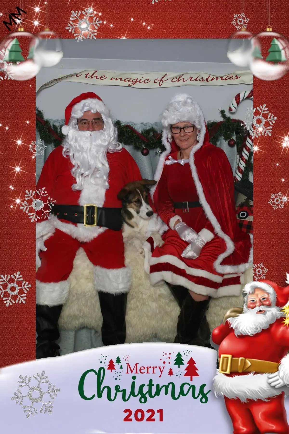 Santa and Mrs Clause ready for pictures inside the Camper photo Booth with Sasha