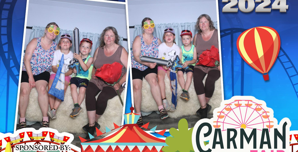 Guests Taking a fun picture with props in A Camper Photo Booth st Carman Country Fair