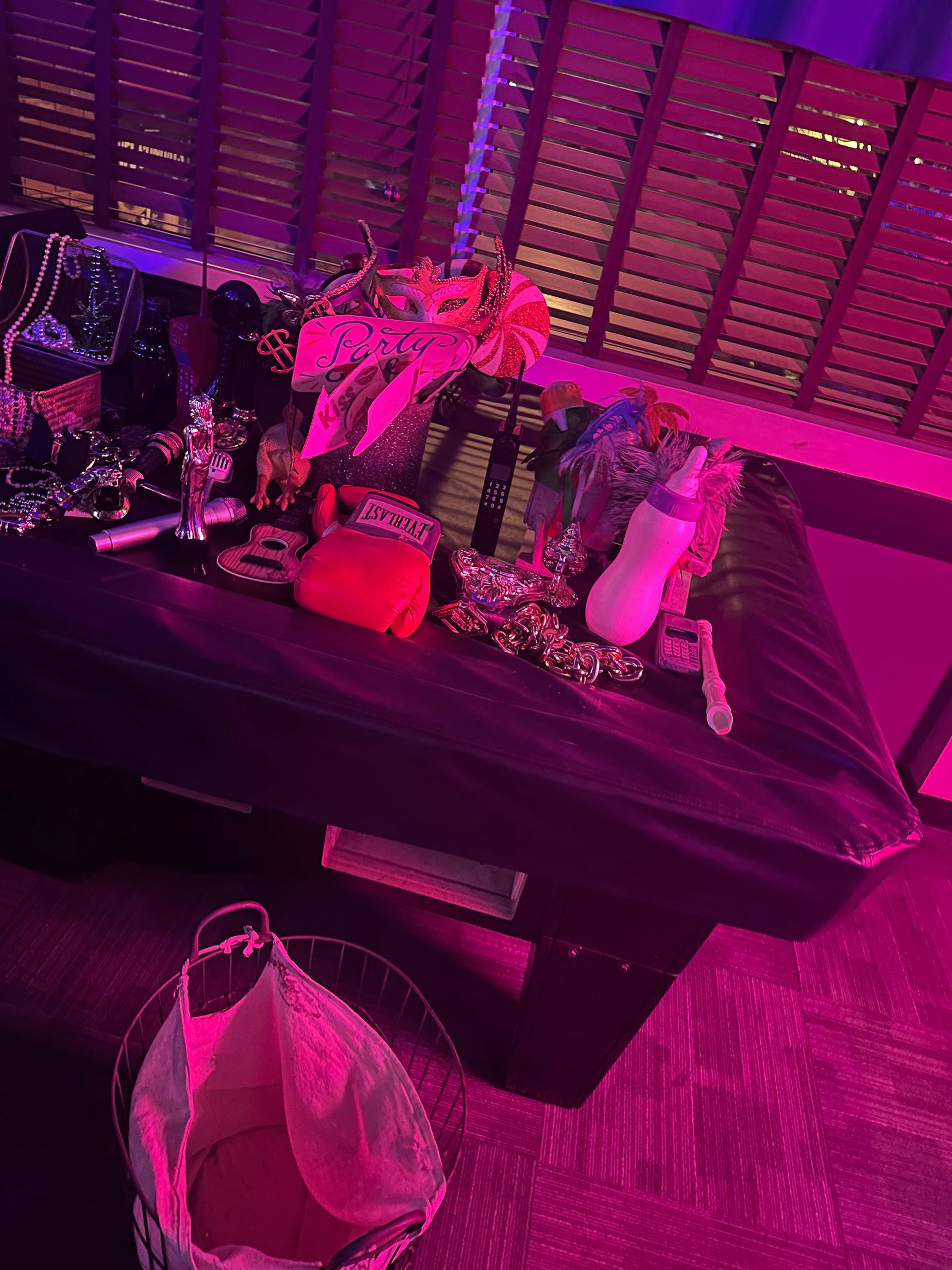 The pool table at Hidden Pocket loaded with props
