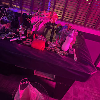 The pool table at Hidden Pocket loaded with props