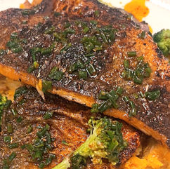 Cajun Sea Bass with Potato Smash & Chive Dressing