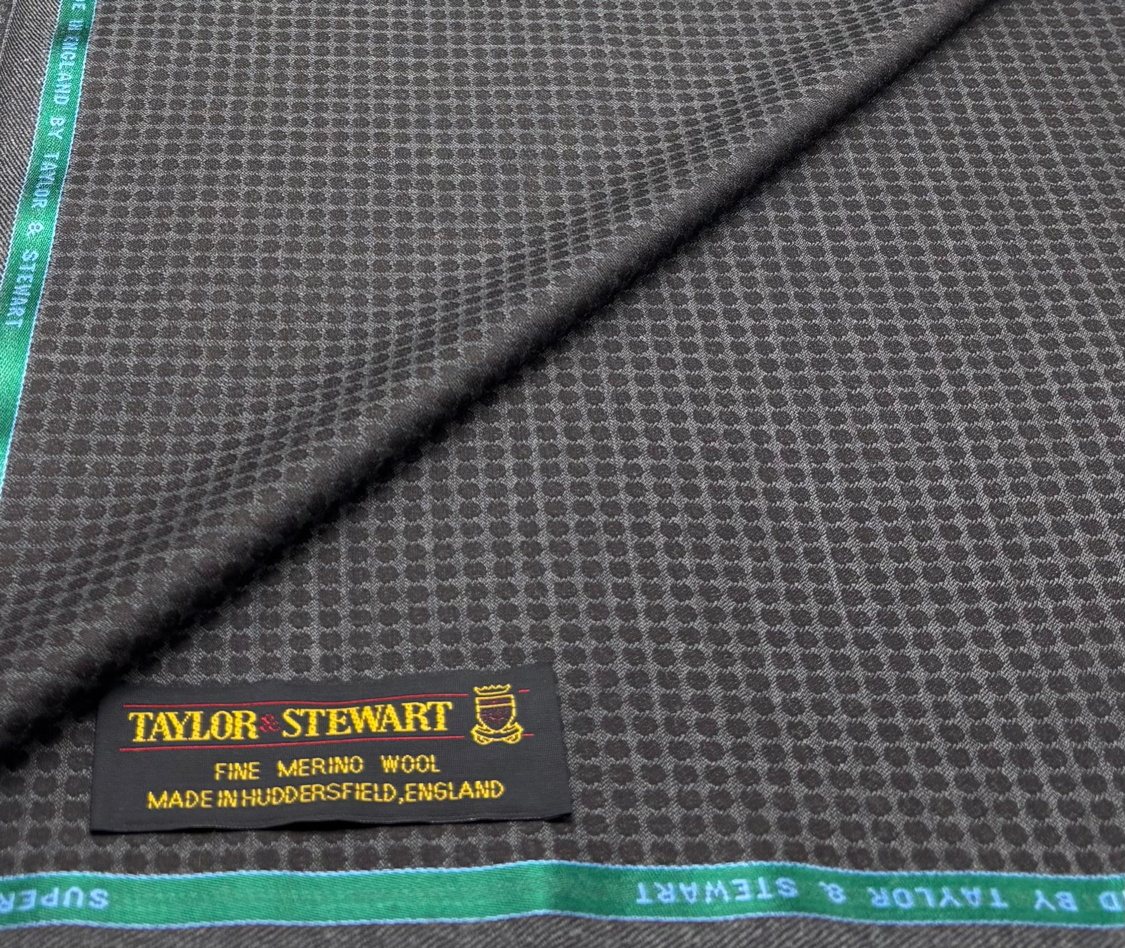 brown geometric wool fabric with dots and woven label