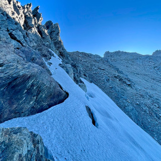 Sidling under Point 1992. I easily scrambled the rock to the left.