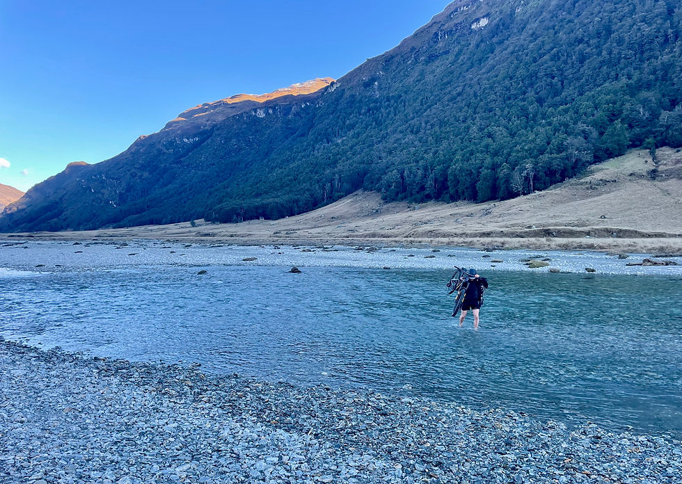 Rob biking up the cold Rees Valley