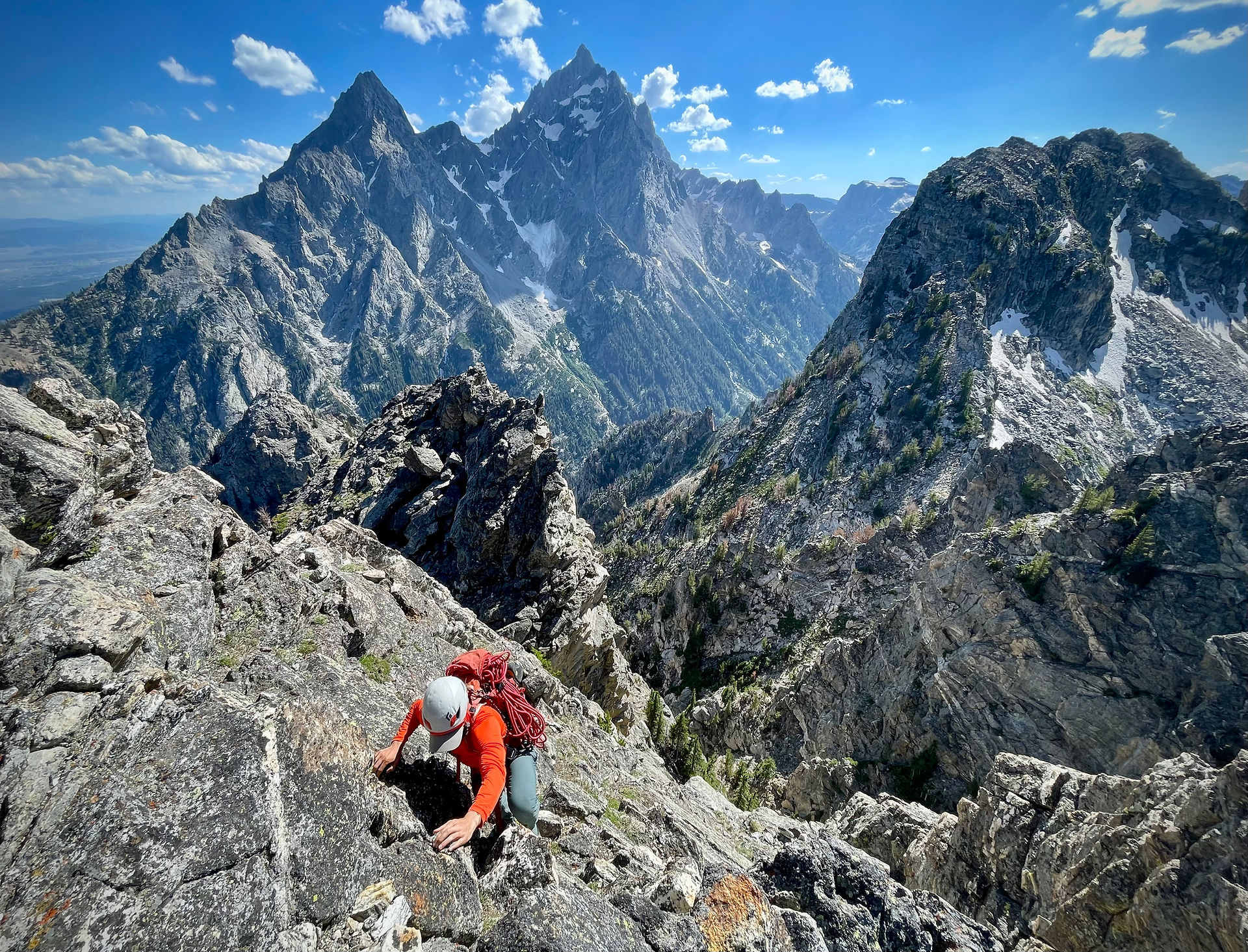 The final exposed scramble to the summit of Symmetry Spire