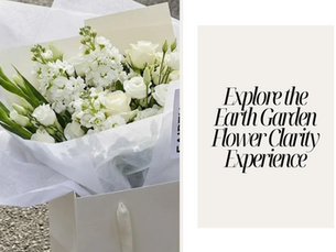 White bouquet of roses and blossoms in a bag beside a beige card reading Explore the Earth Garden Flower Clarity Experience
