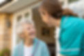 elderly woman being cared for