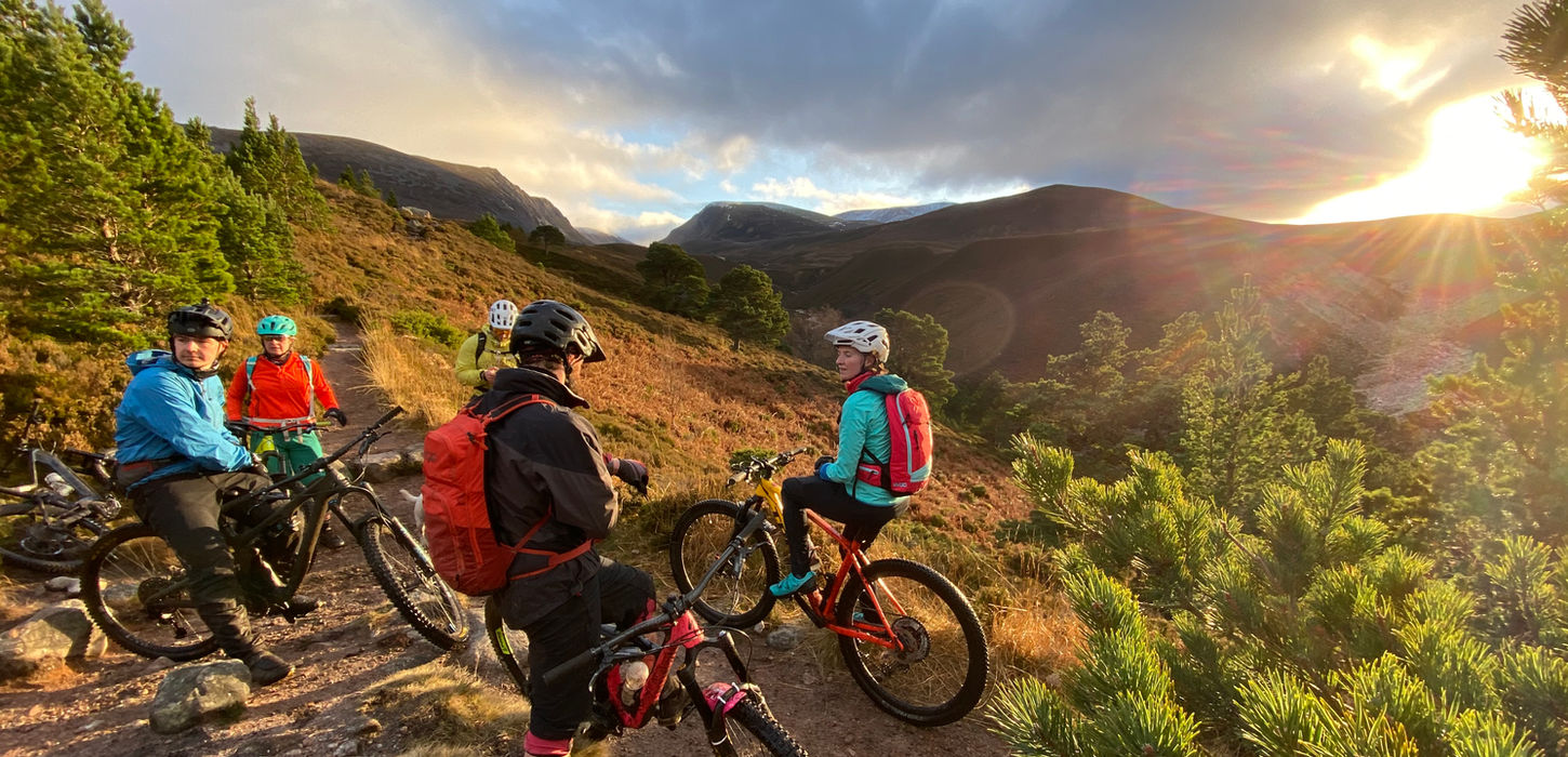 Mountain bikers enjoying sunset views