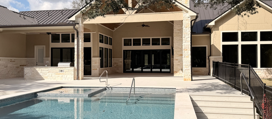 Custom home back patio and pool in Texas