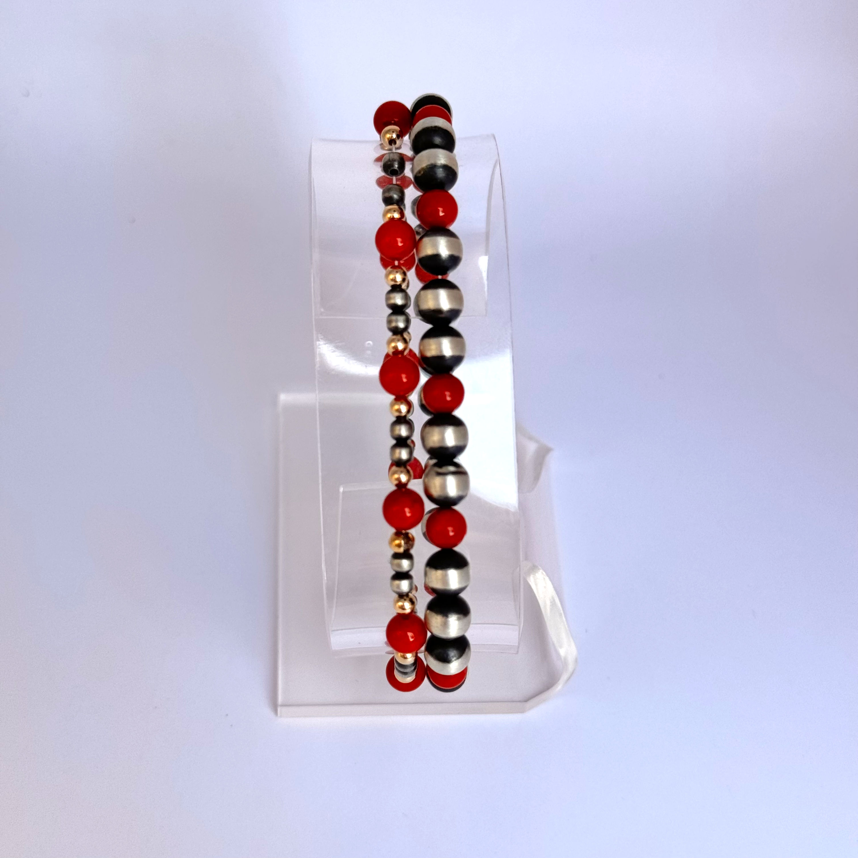 14K Gold, Sterling Silver, & Coral  (available at Luna & Luz, 400 San Felipe NW)