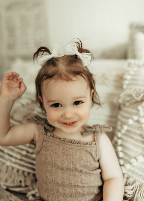 Smiling baby girl portrait during a luxury milestone photography session at Elsiebel Photography serving Burnsville, Minneapolis, Edina, Eden Prairie, Maple Grove, and surrounding areas
