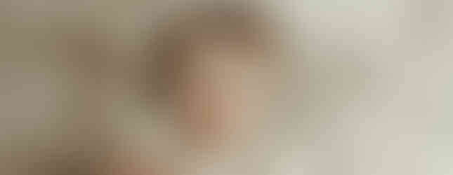 Baby girl celebrating her first birthday with cake smash photoshoot near Maple Grove Minnesota.