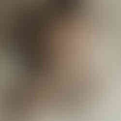 Minneapolis newborn photographer capturing an intimate family moment with parents and baby in a neutral, luxury studio session by Elsiebel Photography.