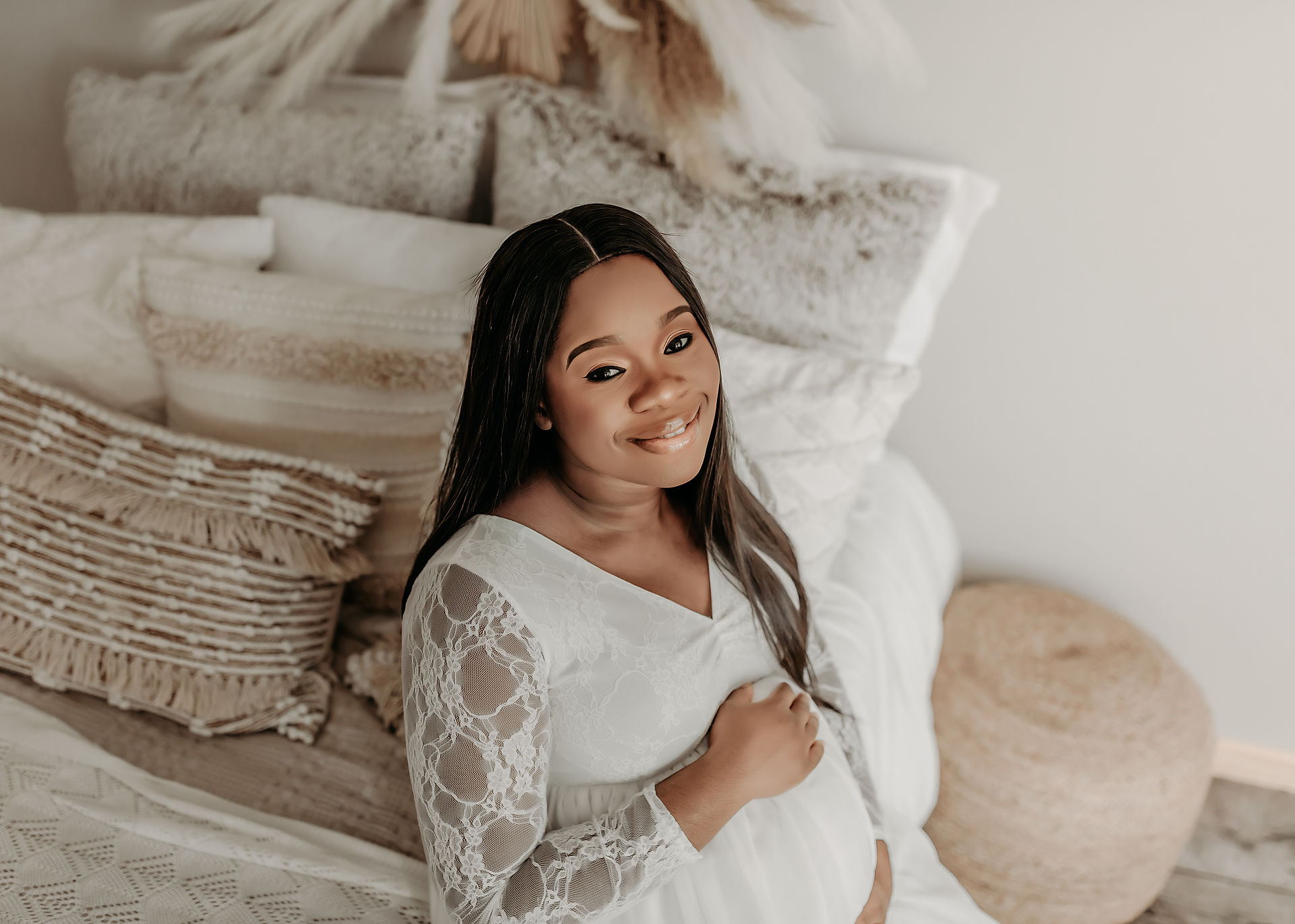 Soft and cozy studio maternity portrait of expecting mom in Lakeville Minnesota by Elsiebel Photography.