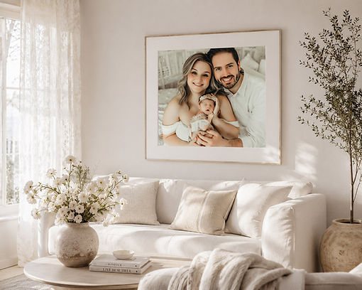 framed family newborn portrait in living room captured by elsiebel photography burnsville mn