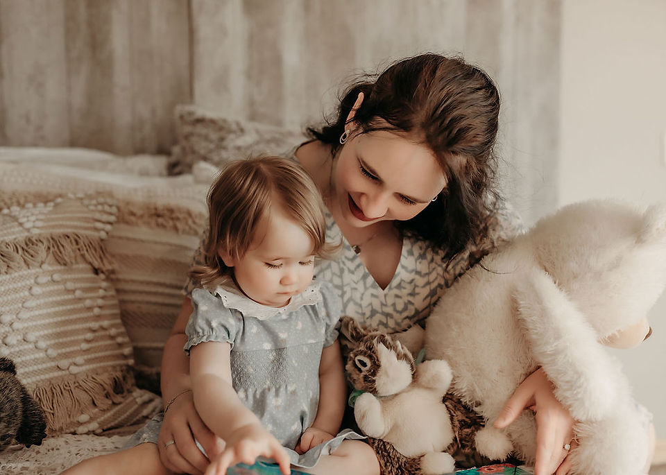 Mama and baby sitting together for a timeless milestone portrait by Elsiebel Photography serving Medina and the West Metro.