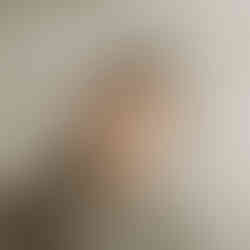 Soft and elegant newborn image of a baby in a neutral bonnet, captured by Elsiebel Photography, serving Minneapolis families.