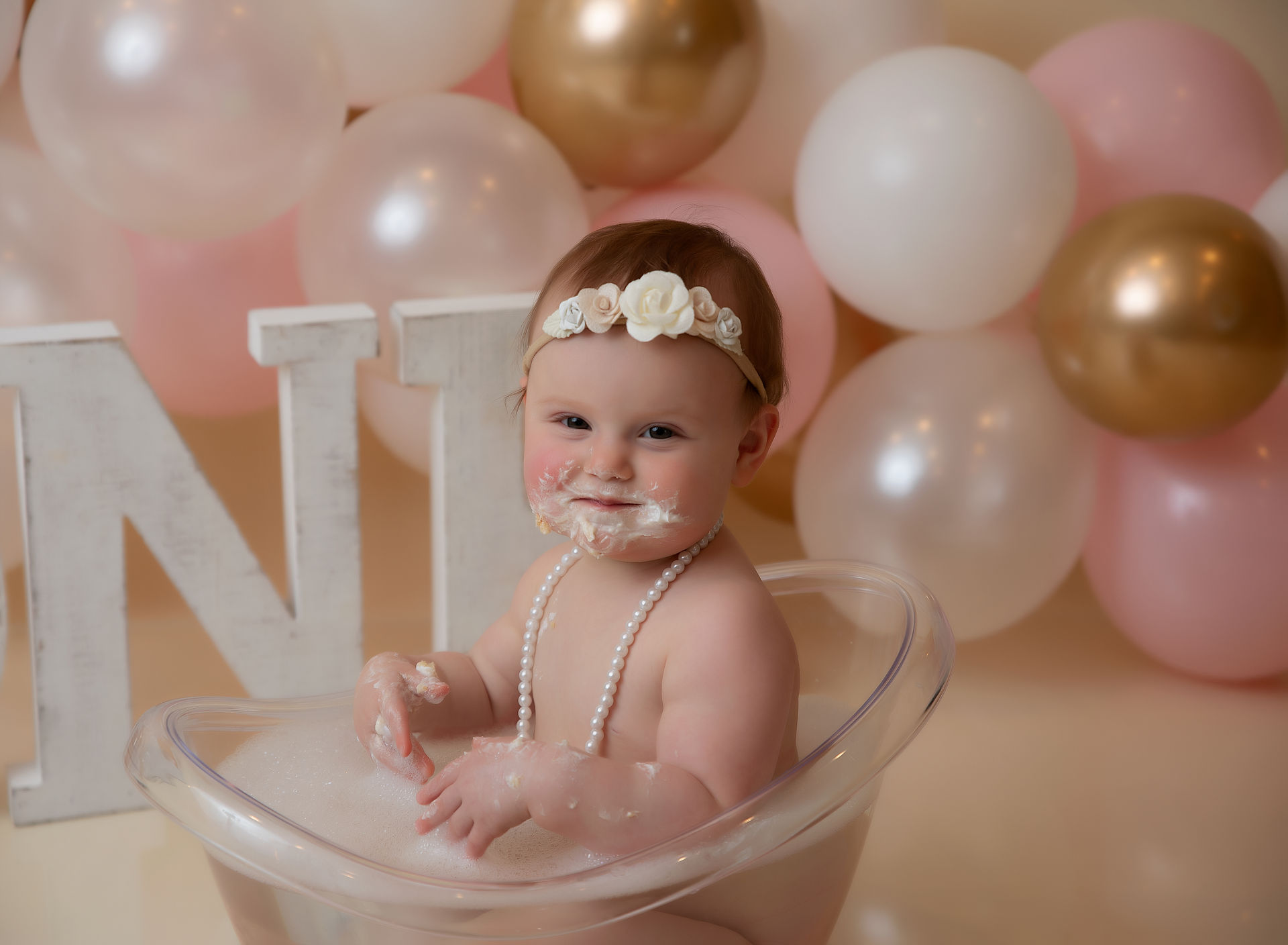 plash bath babys first birthday photoshoot in burnsville mn with elsiebel photography