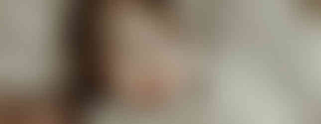 Mother and daughter sharing laughter during a luxury motherhood portrait experience by Elsiebel Photography in Medina, MN.