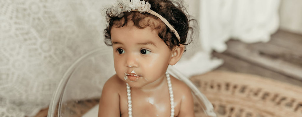 Minimal and timeless first birthday portrait of baby girl sitting in neutral styling, luxury milestone photography Minneapolis by Elsiebel Photography.