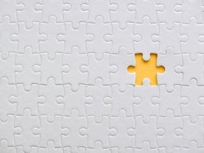 white puzzle missing a piece