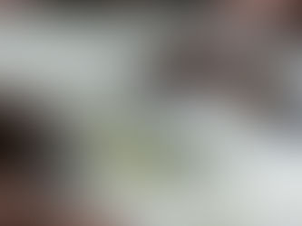 Raging river water flows over and around large rocks